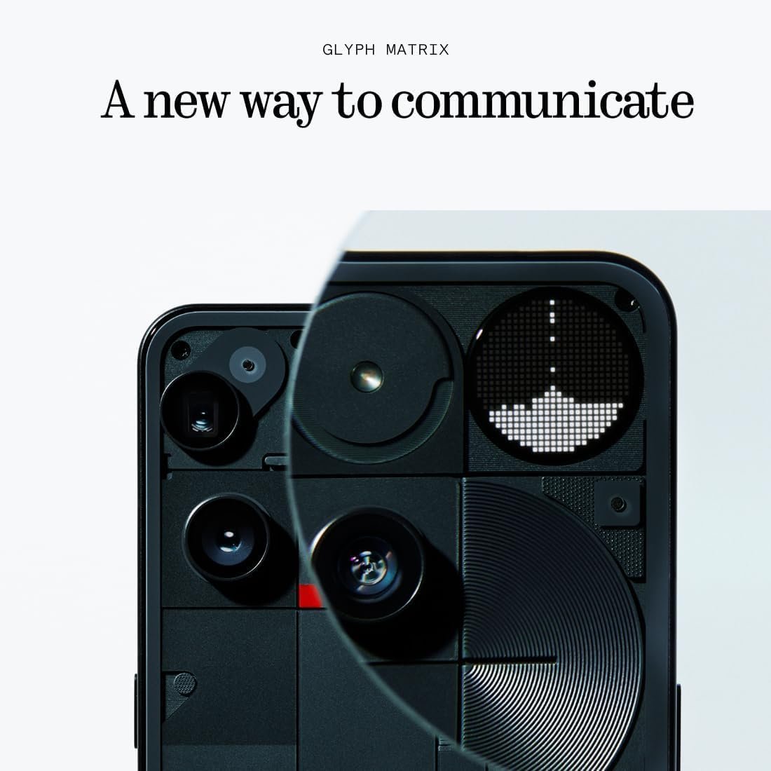Close-up of the back of a black Nothing Phone (3) with a magnifying lens over the round dot-matrix Glyph Matrix display
